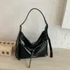 Bolso tote de gran capacidad estilo retro europeo y americano, nuevo modelo 2026, bolso de hombro y cruzado versátil de alta gama para el trabajo