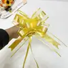 Gran salida de fábrica de cinta de flor de lazo brillante de cara brillante flor de borla tirada a mano de gasa de nieve iridiscente transfronteriza 70#