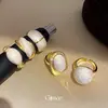 Anillo brillante con baño de oro y nácar con goteo de aceite, sensación de lujo ligero y alta gama, anillo para el dedo índice, diseño de nicho, joyería versátil al por mayor