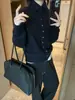 Cardigan de Lana Chic de Solapa de Moda de Este Año para Mujer, Nuevo Estilo Otoño e Invierno, Suéter de Punto Elegante y Sencillo de Un Solo Botón de Color Sólido