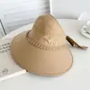 Sombrero nuevo de estilo coreano con parte superior abierta para mujer, versátil para primavera y verano, sombrero de pescador con ala ancha para protección solar, sombrero de sol con lazo