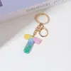 Llavero de Resina Color Arcoíris Letra Inglesa Borla Colgante Creativo Alto Sentido Gota de Pegamento de Cristal Colgante de Bolso