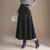 Saia de tricô patchwork casual da moda para mulheres, nova saia de cintura alta em linha A emagrecedora para outono e inverno de 2026, saia elegante com barra larga