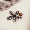 Presilha de Cabelo Flor com Estampa de Leopardo Doce Coreana Novo Estilo Outono/Inverno 2026 Temperamento Grampo de Cabelo para Franja Lateral Cabelo Fino para Mulheres