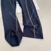 Calça de Moletom Cropped Azul Marinho Estilo Americano com Barra Curva para Homens, Temporada de Outono, Costura Exposta, Calça Flare com Caimento, Calça Esportiva Casual High Street