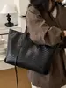 Bolsa de Gran Capacidad para Viajes Transfronterizos para Mujer 2026 Nueva Bolsa Tote Bolso de Hombro de Color Sólido Texturizado para Mujer Bolso Grande Tejido