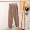 Invierno 2023 nuevos cómodos pantalones cálidos de terciopelo de algodón jacquard pantalones de toalla casuales cálidos hermosos para el hogar pareja pantalones casuales