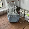 Bolsa balde de mão da moda estilo coreano, novo modelo de verão 2026, design de nicho ins, bolsa de ombro/transversal estilosa e única