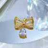 Colgante de Moño y Gota de Agua de Cobre y Oro Elegante Comercio Exterior Transfronterizo DIY Hecho a Mano Joyería Cobre Circonita Microincrustado Colgante Accesorio