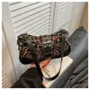 Bolso pequeño de moda con estampado de leopardo transfronterizo para mujer, nuevo bolso de hombro de alta gama para el trabajo, versátil bolso de hombro y bolso de mano