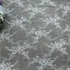 Tela de encaje hueco de malla ligera y fina de fábrica directa Tela de encaje para falda transparente Ropa interior