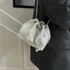 Bolsas Pequeñas de Moda Transfronterizas para Mujer Este Año, Bolsas de Tela Estilo Nuevo 2026, Bolsos Cubo con Cordón, Bolsos Cruzados Versátiles con Cadena