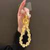 Pulsera Lanyard para Teléfono Cadena de Muñeca Llavero Colgante para Bolso Perla de Colores Dopamina Tacto Mate Antiperdida