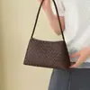 Bolso de axila ligero y lujoso con textura tejida para mujer, nuevo modelo transfronterizo 2026, bolso de mano elegante, bolso de hombro, bolso baguette para el día a día
