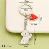 Llavero colgante de perro con goteo de aceite de aleación DIY nuevo, accesorio de llavero de diseño creativo, venta directa del fabricante