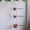 Cesta colgante de flores de paja hecha a mano Pastoral para colgar en la pared Plantación verde Maceta para flores carnosas Arte de la personalidad Cesta colgante de sauce multicapa