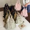 Transfronterizo 2026 Verano Nuevo Cordón Viaje Diario Simple Moda Versátil Gran Capacidad Mochila Bolso de Mano Bolso de Hombro