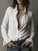 Camisa de moda transfronteriza estilo francés con cuello de solapa, botones de un solo pecho, puños acampanados y un diseño corto que ciñe la cintura.
