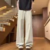 En stock verano 2026 secado rápido seda de hielo transpirable diseño deconstruido pantalones de pierna recta marca de alta gama de moda pantalones largos holgados para hombre