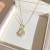 Nuevo producto transfronterizo: Collar sencillo y único de microincrustaciones de diamantes completos para mujer, diseño fresco, popular en línea, exquisito accesorio de cadena para la clavícula
