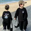 Otoño 2026 Nuevo Ropa Interior Básica de Primavera y Otoño para Niños Camiseta de Algodón Puro Manga Larga Dibujos Animados Guapo Tendencia
