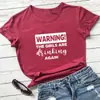 Advertencia Las Chicas Están Bebiendo de Nuevo Camiseta de Comercio Exterior Europea y Americana impresa