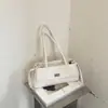 Bolso de mujer con patrón de rombos, nuevo modelo de otoño 2026, bolso de nicho de lujo ligero de alta gama para el día a día, bolso de hombro y axila de gran capacidad