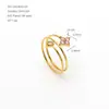 Anillo europeo de tres capas con circonita en espiral de acero inoxidable de banda delgada de múltiples colores de diamante doble estilo lujo ligero anillo abierto ajustable