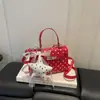 Estilo Coreano Sistema Coreano Transfronterizo 2026 Diseño de Hebilla con Estampado de Puntos Redondos Bolso de Mano para Mujer Bolso de Hombro Bolso Cruzado Bolso Cuadrado Pequeño