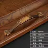 Suministro directo de fábrica Manija de cajón antigua china Manija de hardware Manija de gabinete de zapatero minimalista moderno Manija de puerta de armario Armario Armario