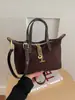 Bolso para Mujer 2026 Nuevo Modelo Nicho Rayas Mezclilla Forma de Dumpling Retro Simple Bolso de Mano Gran Capacidad Bolso de Hombro