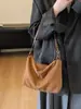 Bolsa de ombro casual retrô transfronteiriça para mulheres, nova moda outono 2026, bolsa de mão moderna, bolsa transversal versátil para o dia a dia