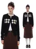Suéter cárdigan de punto retro de alta gama con patrón de rombos negros para mujer, corte ajustado, top adelgazante para otoño e invierno