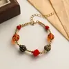 Pulsera de cuentas esmaltadas de color retro artístico dorado de estilo antiguo medio chino, estilo étnico Dunhuang, regalo para novia