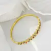 Fornecimento transfronteiriço de moda europeia e americana, banhado a cobre, cor de ouro real 18k, retenção de cor, micro cravação de zircônia colorida, pulseira, pulseira da moda mais vendida