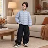 Ropa para niños, chaqueta de plumón para niños, nuevo estilo de invierno 2026, prenda superior ligera de plumón de pato blanco, ropa abrigadora para bebés y niños