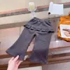 Conjunto de Dos Piezas para Niñas de Primavera y Otoño: Elegante Conjunto de Moda Coreana para Bebés y Niños: Camiseta Rayada con Cuello de Muñeca y Pantalones con Falda Volante