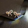 Brincos Elegantes de Laço Estilo Fada Femininos Estilo Coreano Elegante Cyber Celebridade Clipe de Orelha com Diamante Sem Furos na Orelha Luxo Coração de Menina e Tarraxas de Brinco