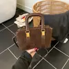 Bolsa de Mão Transfronteiriça de Lã de Cordeiro Outono para Mulheres 2025 Novo Estilo da Moda Bolsa de Ombro Bolsa Transversal Tendência de Nicho