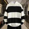Nuevo tejido de punto para suéter de otoño e invierno, prenda exterior unisex, suéteres a rayas de corte holgado para adolescentes, suéteres de bloques de color de moda para parejas