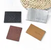 Etiquetas de cuero repujado, ropa hecha a medida, jeans, etiquetas de cuero PU, accesorios con logo repujado, etiquetas de cuero personalizadas