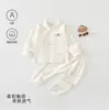 Conjunto sin costuras de algodón puro Clase A para recién nacidos, body de botones laterales con cuello mao para bebé, protección alta para la barriga, conjunto de dos piezas para casa de primavera y otoño