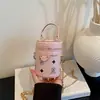 Bolsa pequena cilíndrica com estampa de desenho animado para mulheres, nova coleção 2026, bolsa de balde feminina versátil de alta qualidade vintage