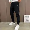 Marca da moda primavera e outono novos calças de moletom esportivas skinny masculinas estilo coreano da moda celebridade da internet casuais folgadas com amarração no tornozelo calças harém