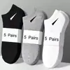 Fabricante de Zhuji Venta al por mayor y Dropshipping Calcetines Deportivos y Casuales de Color Sólido Nuevos para Primavera y Otoño para Hombres y Mujeres