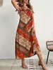 Vestido de tirantes bohemio estampado estilo resort europeo y americano para mujer, sin mangas, holgado, adelgazante, elegante, de longitud media, venta al por mayor