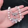 Pulsera Avanzada Sense Moda Celebridad de Internet Lazo Perla Agitar Voz En Vivo Diamante Completo Mariposa Pulsera Ajustable Estilo ins