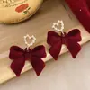Acessórios de Orelha em Alta no Tiktok Estilo Ano Novo Brincos Vermelhos Personalizados Brincos da Moda Versáteis Tachos de Orelha Ganchos de Orelha Presilhas de Orelha para Mulheres