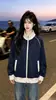 Sudadera con cremallera de diseño moderno y único estilo coreano en bloques de color para mujer, nuevo top casual versátil 2026