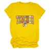 Camiseta informal básica de cuello redondo versátil para mujer, de manga corta, con diseño de profesor, lápiz y lazo, en stock, sitio independiente de Amazon